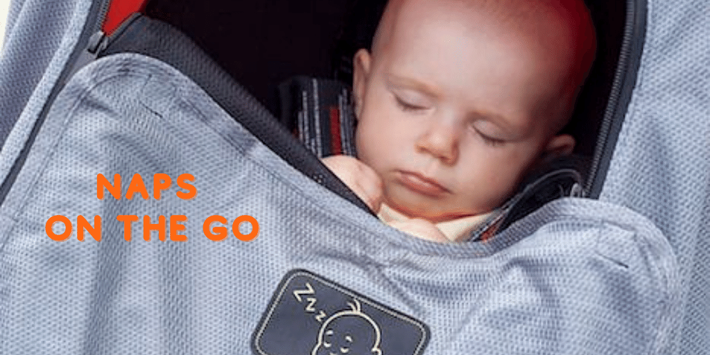 Baby asleep in buggy with SnoozeShade Plus Deluxe